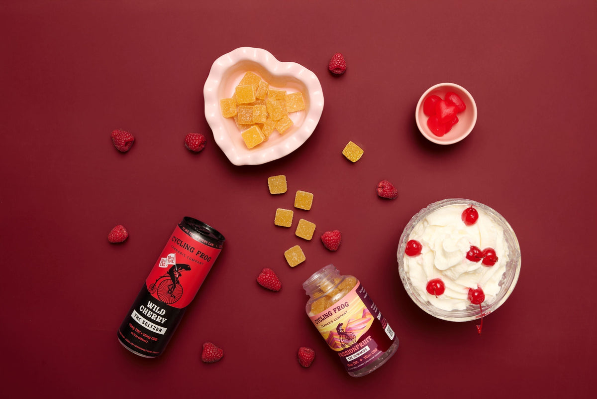 a selection of Cycling Frog products against a red background and heart shaped themes.