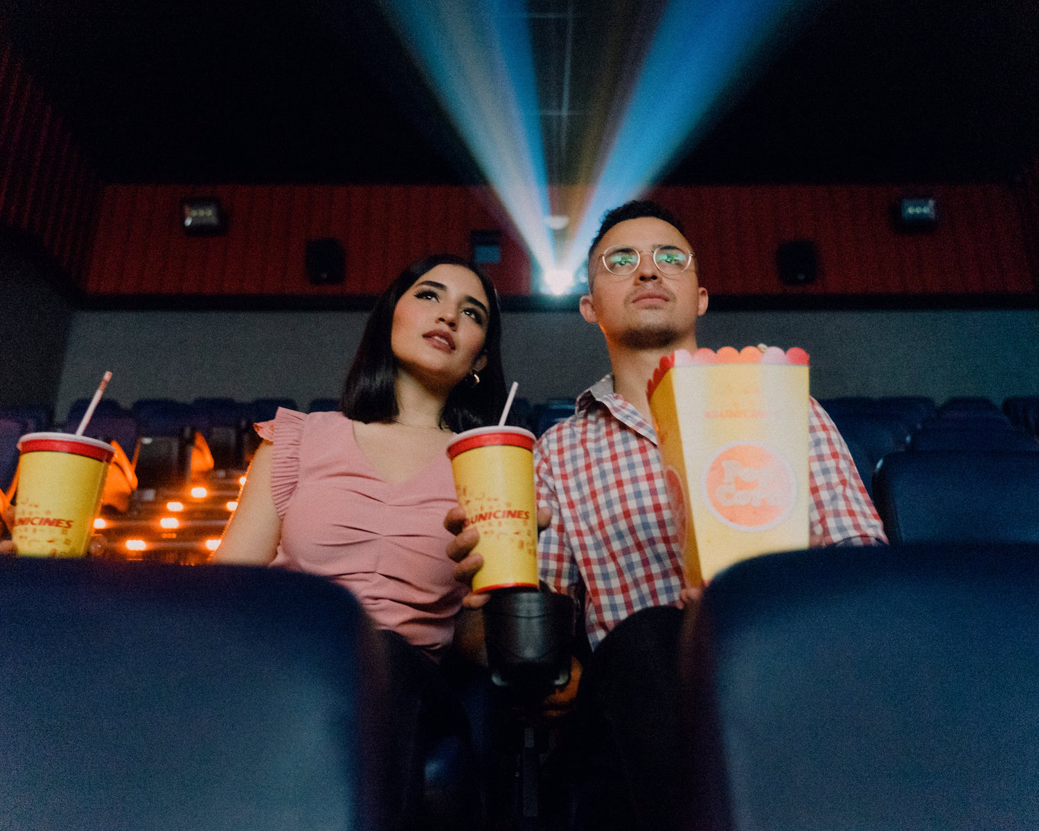 Couple in the cinema watching a film